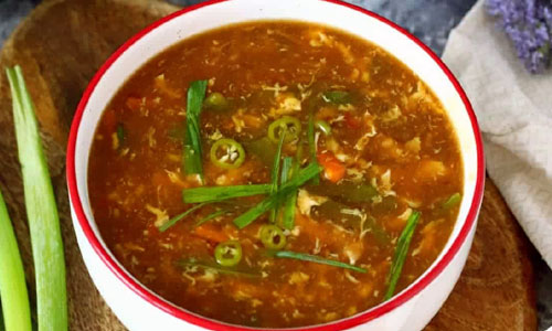 Hot and Sour Soup steaming in a traditional bowl